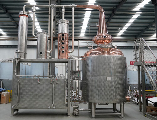 Why do distilleries use hybrid distillation to achieve versatility?